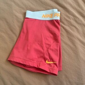 Nike Pro Coral Shorts with Light Blue Waistband